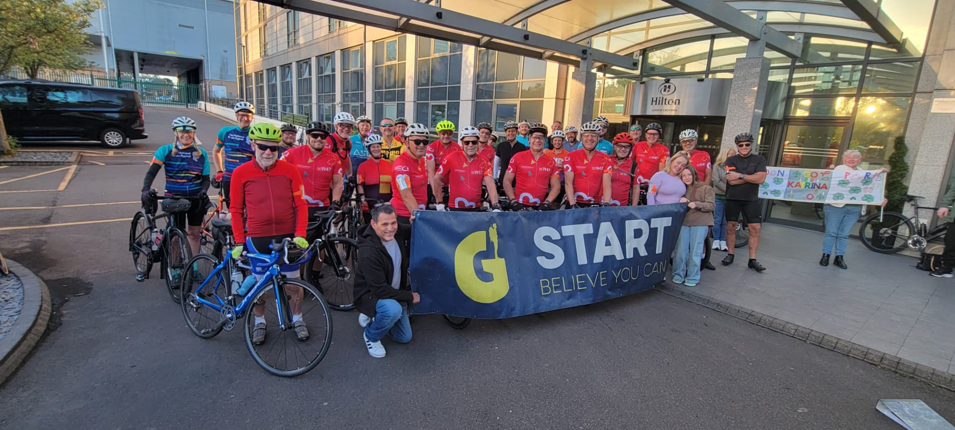 Cyclists gathered at the start line of the London to Paris charity cycle challenge
