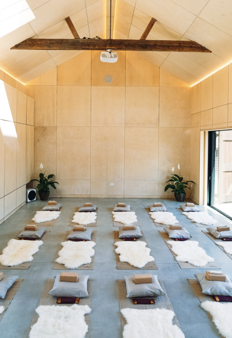 The Quaives movement studio with cushions and sheepskins